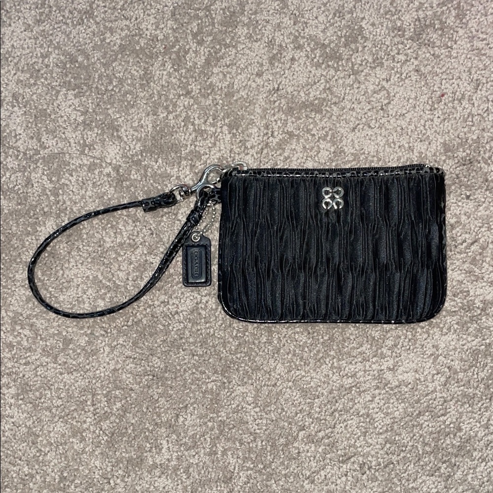 Add-on for $7
Coach Black Wristlet with Silver Logo preloved